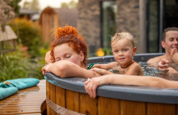 wooman in wood fired hot tub closed eyes